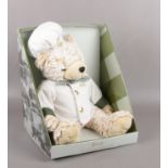 A boxed Harrods bear. The annual bear 2018, dressed in chefs whites.