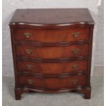 A mahogany serpentine chest of 4 drawers. (85cm x 76cm)
