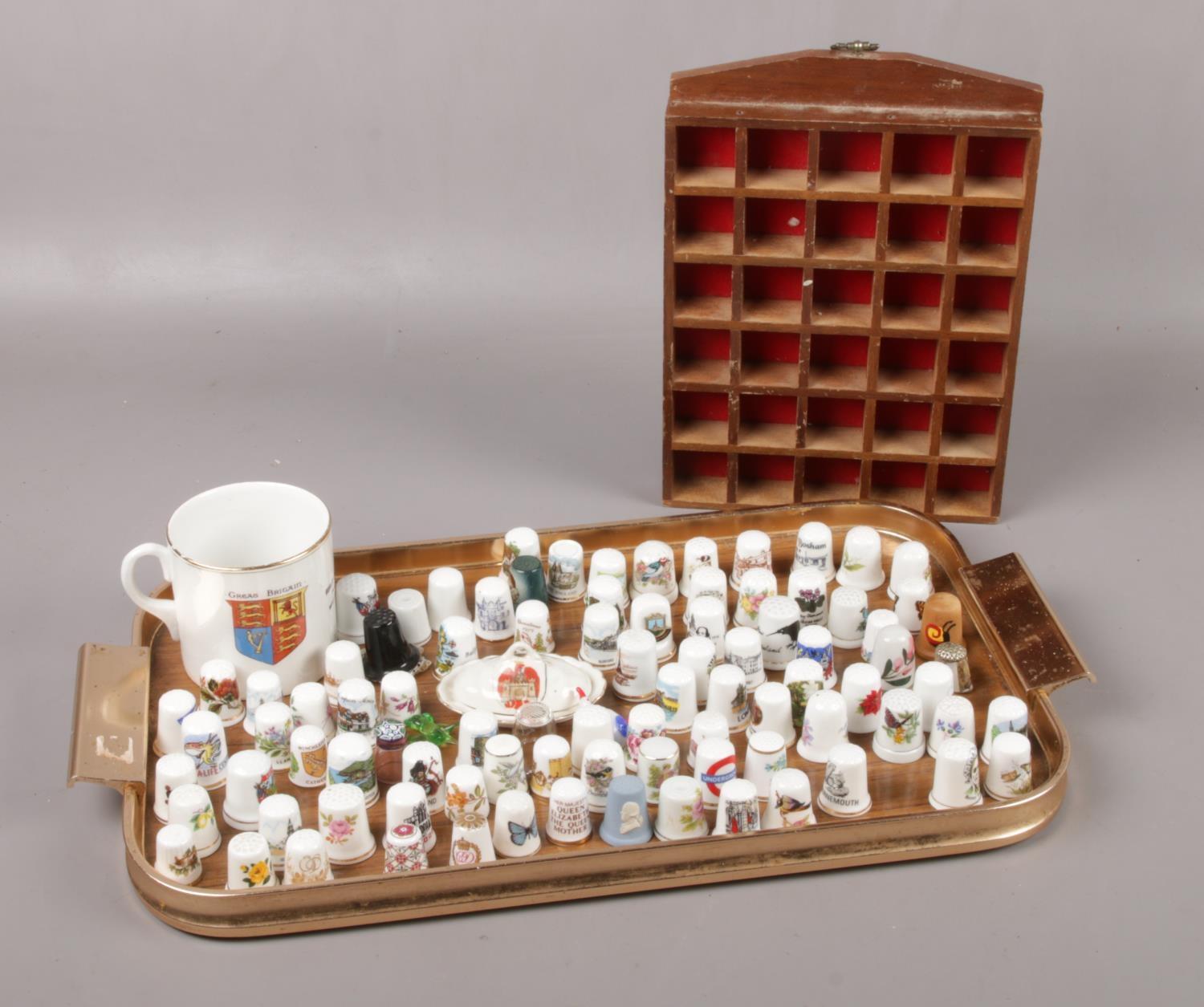 A collection of ceramic Thimbles, Spode, Royal Worcester, Wedgwood examples