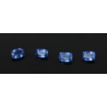 Four large natural sapphires of cushion cut form. All heat treated, largest 8.32ct, smallest 7.15ct.