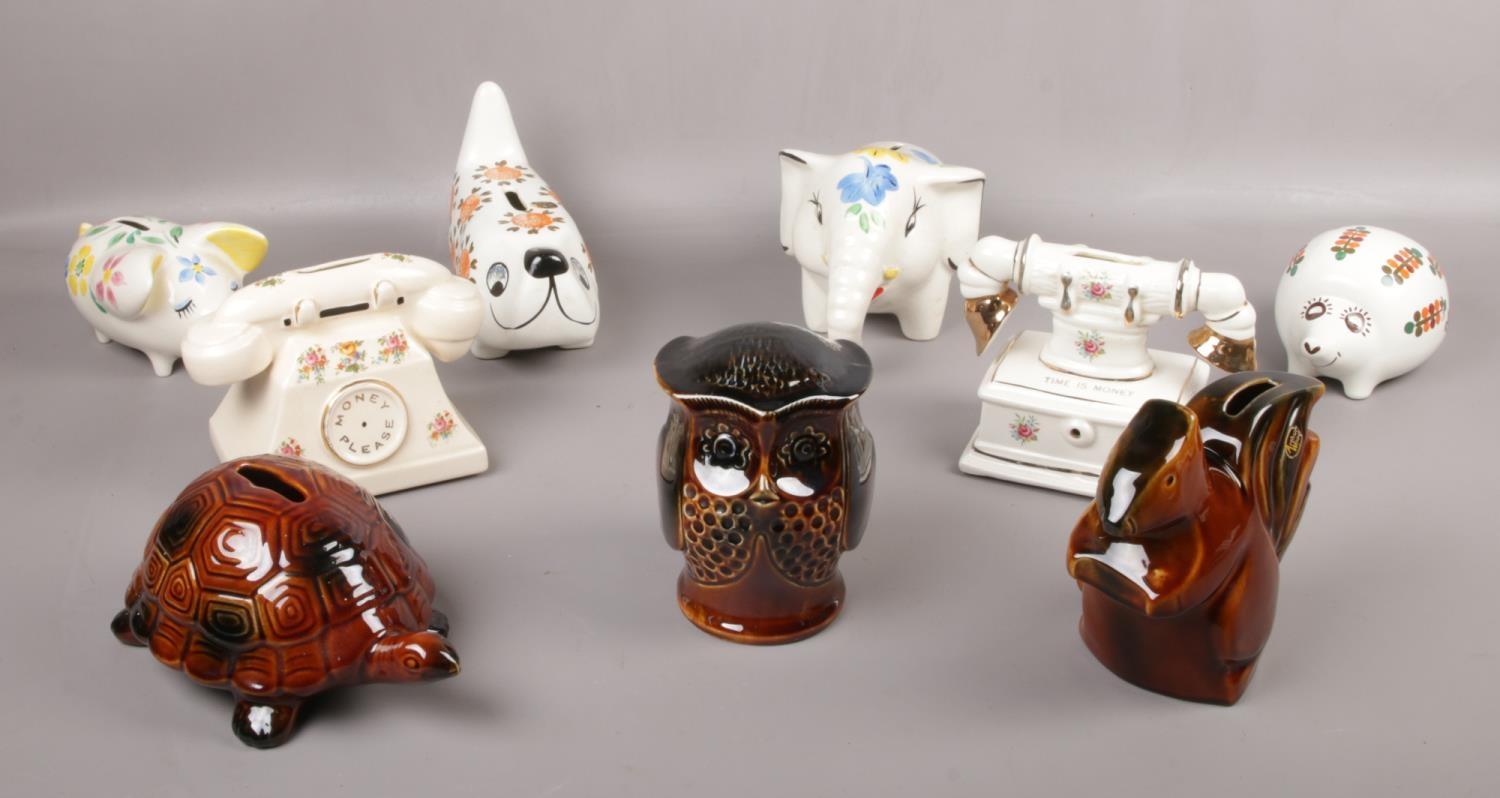 A collection of Arthur Wood ceramic's, Squirrel, Owl, Tortoise, elephant money boxes examples