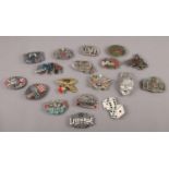 A collection of belt buckles, Budweiser, British Bulldog, Elvis, Jack Daniels examples