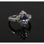 A 14ct white gold marquis tanzanite and diamond ring. Size O.