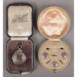 A part set of George V silver and guilloché enamel dress buttons by J Aitkin & Son, each button with