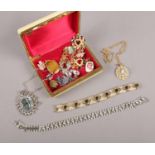 A collection of costume jewellery, to include pendants on chains ,earrings, bracelets etc.