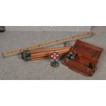 A collection of Hilger & Watts surveyors equipment, to include target, theodolite tripod stand and