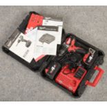 A Milwaukee M18 Brushless battery drill. With two batteries, charger and hard case. (chuck AF)