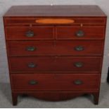 An inlaid mahogany chest of 2 over 3 drawers. (107cm x100cm).