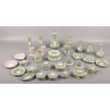 A collection of Wedgwood Green & Pink Jasperware, pair of candlesticks, bud vases, trinkets, pin