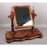 A Victorian mahogany toilet mirror.