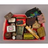A box of assorted collectables, to include tins, hand fan, Royal Air Force Station locket on chain