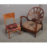 A Victorian nursing chair along with a child's wooden chair.