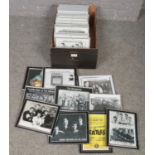 A box of framed magazine cut outs to include Merseybeat Legends, Beatles flyer, printed