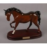 A Royal Doulton horse figure, ' Spirit of Freedom' on wooden plinth, height 22 cm