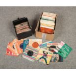 A box and a carry case of single records and EPs, to include picture sleeves, The Beatles, Bob