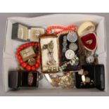 A box of vintage costume jewellery and collectables. Including coral coloured beads, cufflinks,