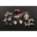 Eight pairs of silver earrings, including paste set examples.