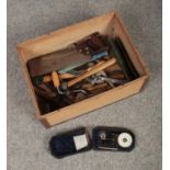 A box of tools, to include Stanley saw, spanners etc.