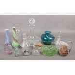 A collection of glassware, to include Mdina vase, paperweights, decanter, scent bottles etc.