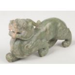 A Chinese carved jade coloured hardstone statue of a mythical beast, 19cm. Good condition. No cracks