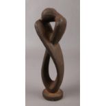 A cast metal modernist figure of a couple. (20cm).