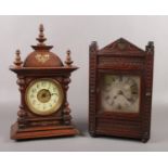 A carved oak cased 8 day mantel clock by Winterhalder and Hofmeier and another mahogany cased mantel