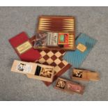 A collection of chess boards, chess pieces, games set etc.