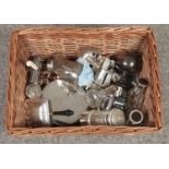 A basket of silver plate and metalwares. Including novelty money boxes, cigarette boxes and scent