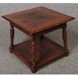 An Archer & Smith oak two tier occasional table.
