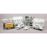A collection of The Beatles diecast model vehicles, mainly boxed.