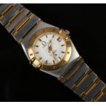 A ladies bi-metal Omega Constellation Chronometer quartz wristwatch, with baton markers, date