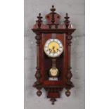 An early 20th century mahogany cased time and strike wall clock.