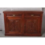 A carved mahogany sideboard. Formally a mirror back sideboard.