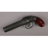 A reproduction pepper pot revolver.
