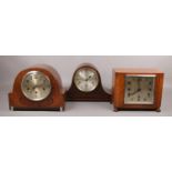 Three 8 day Westminster chime mantel clocks.