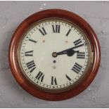 A Victorian mahogany fusee circular wall clock, made in Tameside, England.