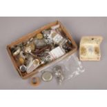 A box of assorted wrist & pocket watch spares to include cases, movements etc.