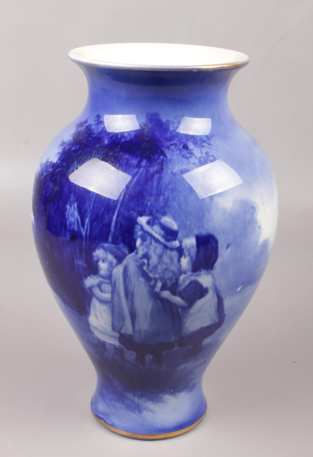 A Royal Doulton blue children series vase of baluster form. (Height 26cm) Good Condition.