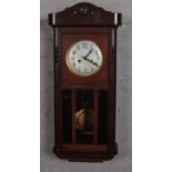 A Mahogany cased wall clock