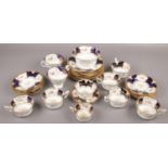 A Coalport part tea service to include cup & saucers, sugar bowl etc.