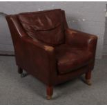 A Gainsborough lounge suite tan leather armchair