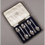 A cased set of six silver spoons assayed Sheffield 1922 by Cooper Brothers & Sons Limited.