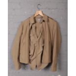 A genuine post Word War II Navy issue windcheater deck jacket in Pacific tan (size 38R) , along with