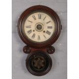 A 19th century mahogany 8 day drop dial wall clock.