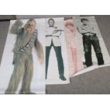 Four large canvas prints, to include James Dean, Chewbacca, Daniel Craig and Kylie Minogue. (Largest