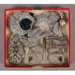 A collection of Art Deco Czech paste set brooches and buckles.