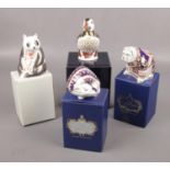 Four Royal Crown Derby paperweights; Hedgehog, Bulldog, Panda and Puffin. All silver stoppers,