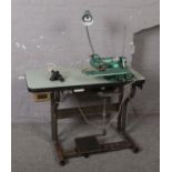 An Adamson industrial sewing machine, style 50AS 5327/S, with work lamp.