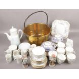 A quantity of ceramic teawares to include Royal Doulton, Wedgwood etc along with a brass and iron
