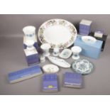 A collection of boxed Wedgwood to include trinket dishes, meat plate, vases etc.